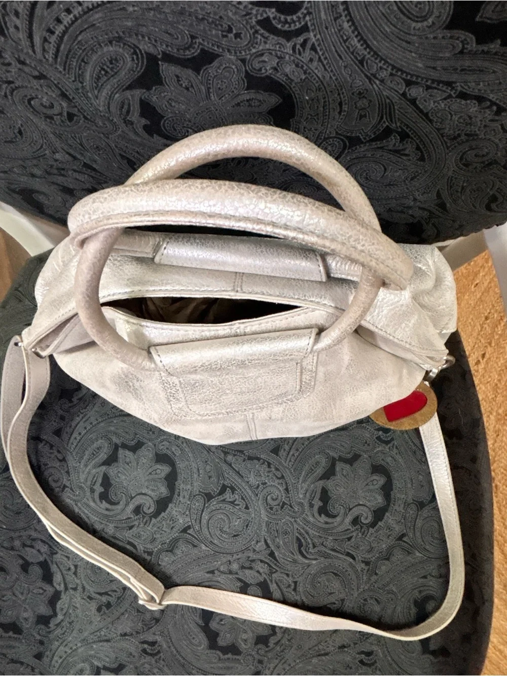 hOBO Metallic Silver Women’s Satchel Bag with Heart Charm